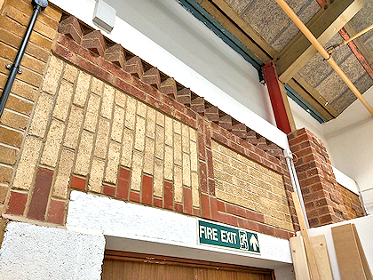 Sample brickwork on display in a wall
