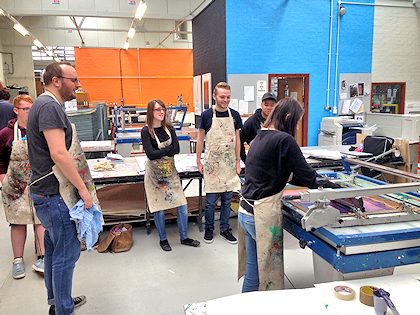 Six people in an art room