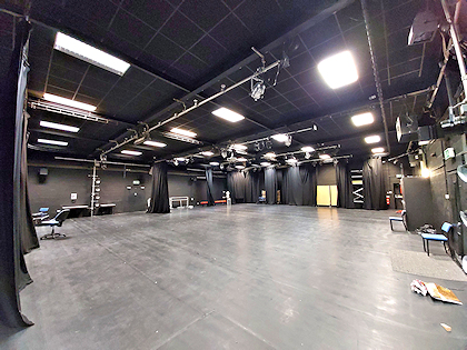 Large performance area inside the Isham building