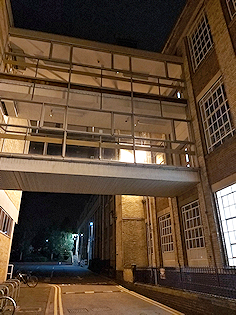Night-time view of the link between Maidwell and its Annexe