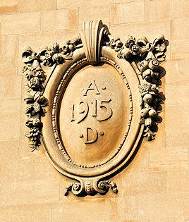Photo of 1915 AD plaque on front of Newton building