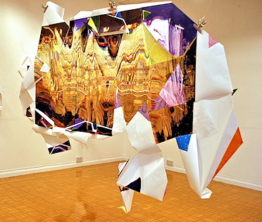 Gold and purple piece of hanging art