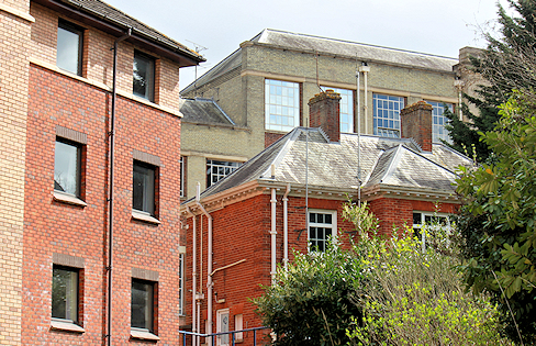 Close-up of three buildings