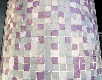Mosaic design on pillars by Maidwell entrance