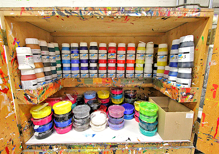 Photo of a cupboard of small paint containers