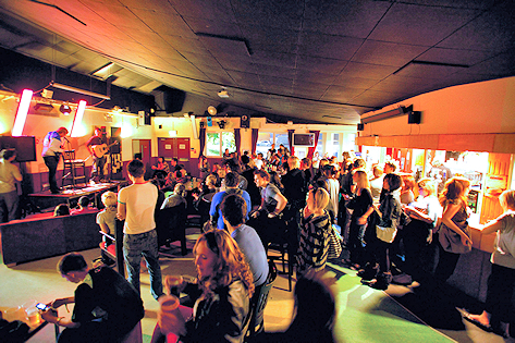 A busy SU with a band playing